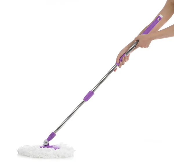 Hand holding a mop cleaning floor isolatedon white background — 图库照片