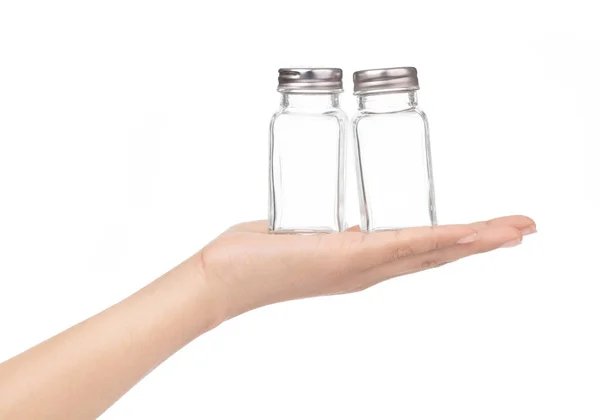 Kézben tartó üveg üveg fűszerezés izolált fehér backgr — Stock Fotó