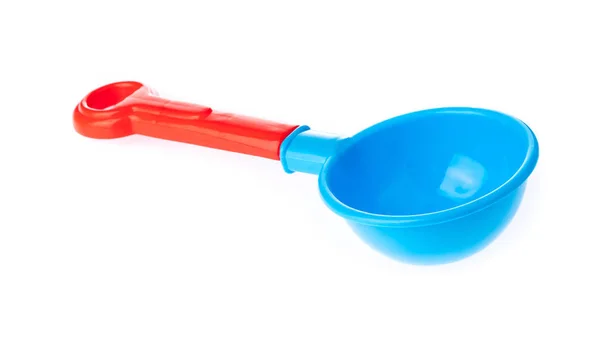 Pala de herramientas de plástico de juguete de playa aislado sobre fondo blanco — Foto de Stock