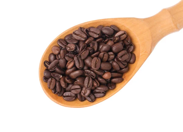 Roasted coffee beans on wood ladle isolated on white background — 图库照片