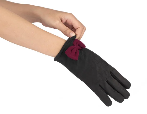 Krásné černé dámské rukavice v ruce izolované na bílém backgro — Stock fotografie