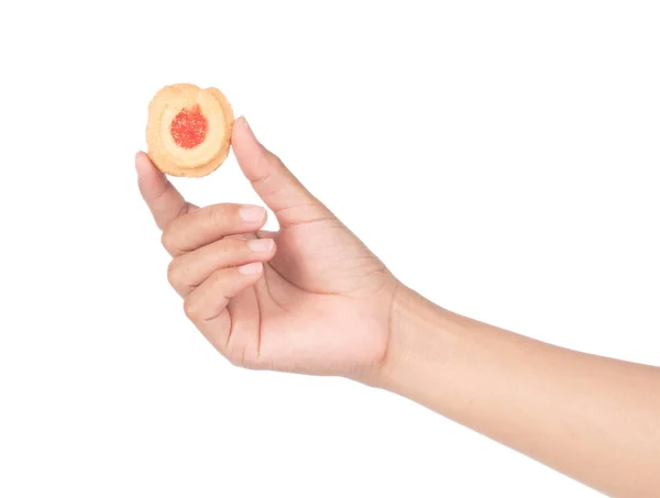 Hand hält Kekse mit Marmelade Erdbeere isoliert auf weißem Rücken — Stockfoto