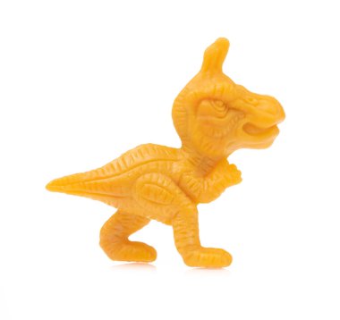 Beyaz arka planda izole edilmiş dinozor oyuncağı