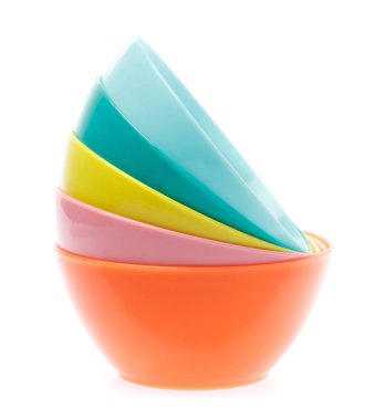 Empty colorful plastic bowl isolated on white background