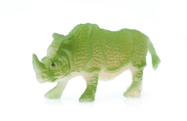 rhinoceros made out of plastic. animal toy isolated on white bac