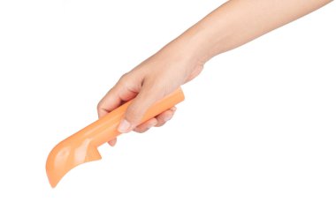 Beyaz sırtüstü uzanmış plastik dondurma kaşığı.