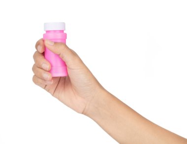 Hand holding Pink plastic bottle isolated on white background
