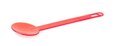 red plastic kitchen utensil isolated on a white background