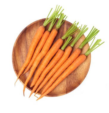 fresh baby carrots on wood dish isolated on white background