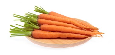 fresh baby carrots on wood dish isolated on white background