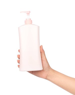 hand holding lotion isolated on white background