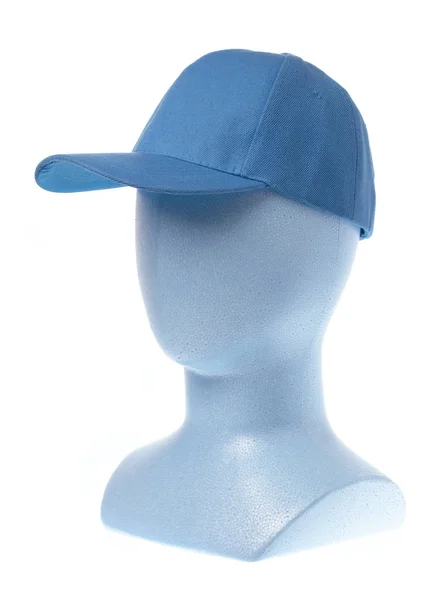 하얀 배경에 고립된 마네킹 머리에 있는 푸른 모자 — 스톡 사진