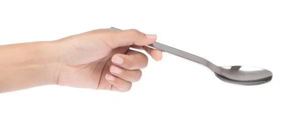 Cucchiaio tenuta della mano isolato su sfondo bianco — Foto Stock