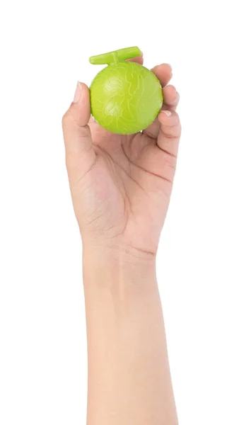Hand hålla frukt leksak plast isolerad på vit bakgrund — Stockfoto