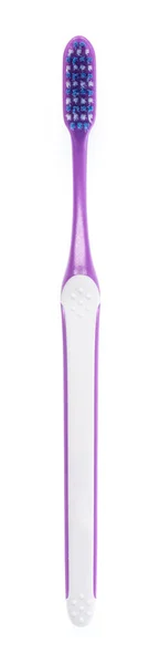 Фіолетова зубна щітка ізольована на білому тлі — стокове фото