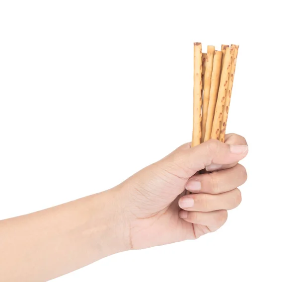 Tangan memegang tongkat cracker asin terisolasi pada latar belakang putih — Stok Foto