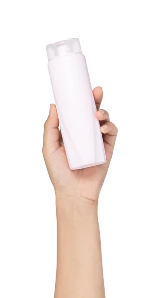 Mão segurando garrafa de condicionador de cabelo isolado no backgr branco — Fotografia de Stock