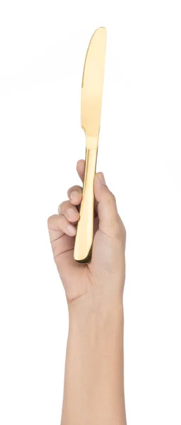 Hand hält goldenes Messer isoliert auf weißem Hintergrund — Stockfoto