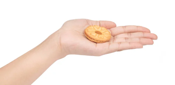 Hand holding Sandwich biscuits, filled with jam isolated on whit — 图库照片