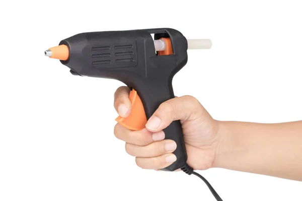 Рука тримає помаранчевий пістолет електричний паяльник для паяльника електро — стокове фото