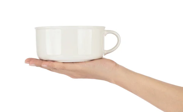 Рука держит пустой белый суп миски изолированный белый фон — стоковое фото