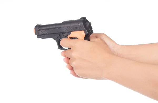 Hand playing with a toy gun isolated on white background — ストック写真