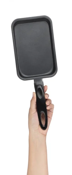 Hand holding Frying pan household cooker non-stick pot isolated — 图库照片