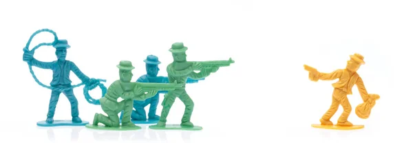Plastic toy cowboys isolated on white background — Stok fotoğraf