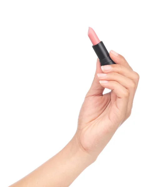 Hand holding Nude lipstick tube isolated on white background. Pi — Stockfoto