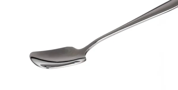 Hand holding stainless ice cream spoon isolated on a white backg — 스톡 사진