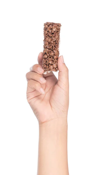 Hand holding Chocolate Cereal Bar isolated on white background — 图库照片