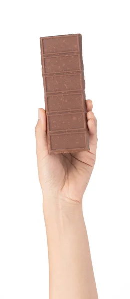 Kézben tartó csokoládé rudak elszigetelt fehér alapon. — Stock Fotó