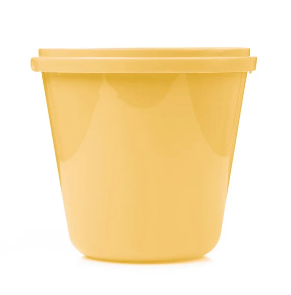 Orange plastic bucket for water isolated on white background — ストック写真