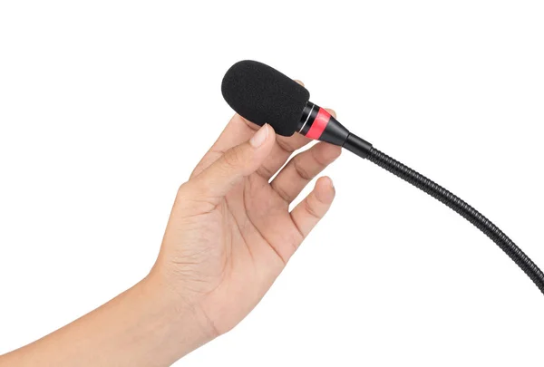 Mão segurando microfone desktop isolado no fundo branco — Fotografia de Stock