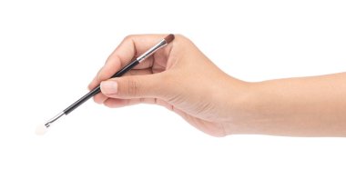 hand holding eyelid shadow isolated on white background.