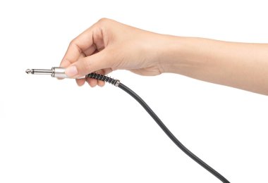hand holding Audio jack connection of microphone isolated on whi
