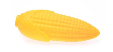 plastic toy corn isolated on white background