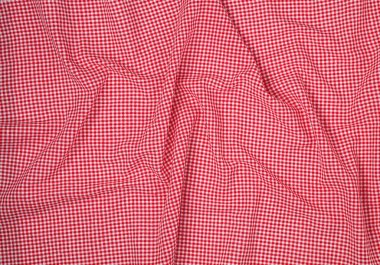 Texture of fabric in a chess cage for wallpaper and background