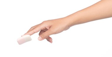 hand holding cosmetic sponges isolated on white background