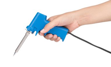 hand holding Gun electric solder for soldering electronic work i