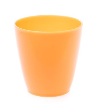 Empty orange plastic glass isolated on white background