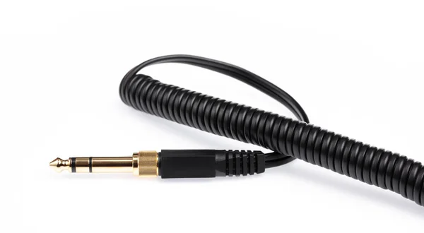 Audio jack s kabelem izolované na bílém pozadí. — Stock fotografie