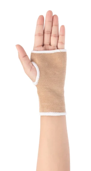 Hand with fabric elastic wrist support isolated on white backgro — Stok fotoğraf