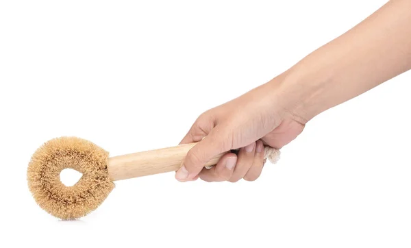 Hand holding Wooden body bath brush isolated on white background — Stok fotoğraf