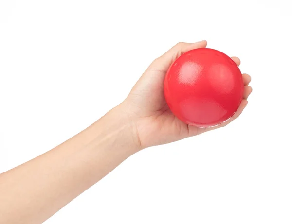 Mão segurando bola brinquedo isolado no fundo branco — Fotografia de Stock