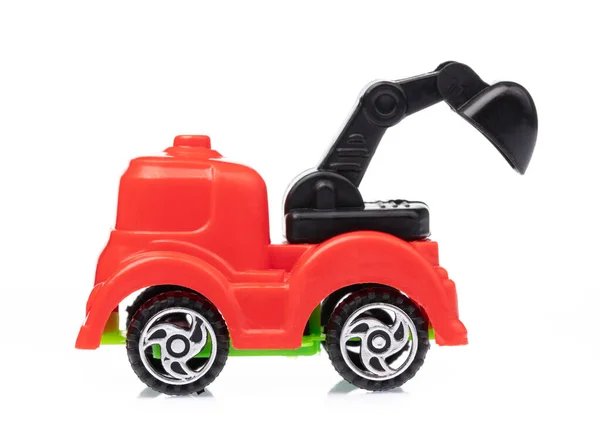 El tractor de juguete aislado sobre un fondo blanco. — Foto de Stock