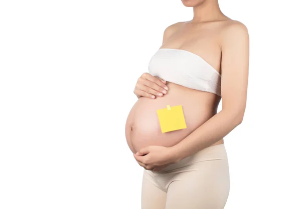 Uma mulher grávida Adivinhar sexo do bebê por nascer isolado no branco b — Fotografia de Stock