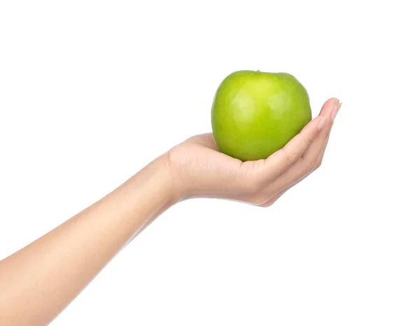 Mano tenuta mela verde isolato su sfondo bianco — Foto Stock