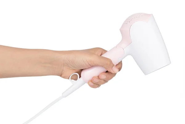 Hand holding Hair dryer color pink Isolated on White background — Stock Photo, Image