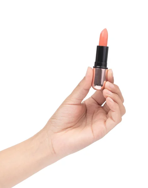 Hand holding Beautiful bright orange lipstick tube isolated on w — 스톡 사진